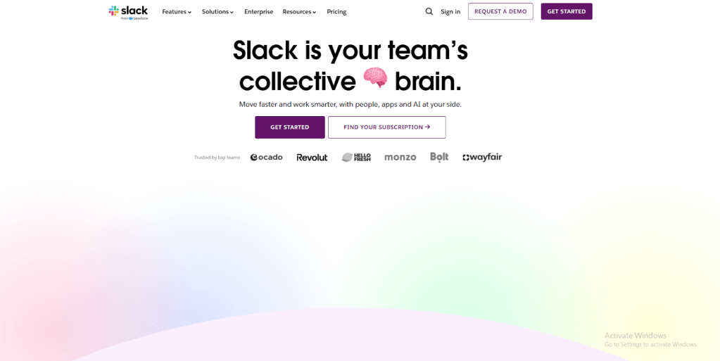 Slack homepage with a tagline emphasizing collaboration and productivity, featuring buttons for getting started and subscription, along with logos of trusted teams.